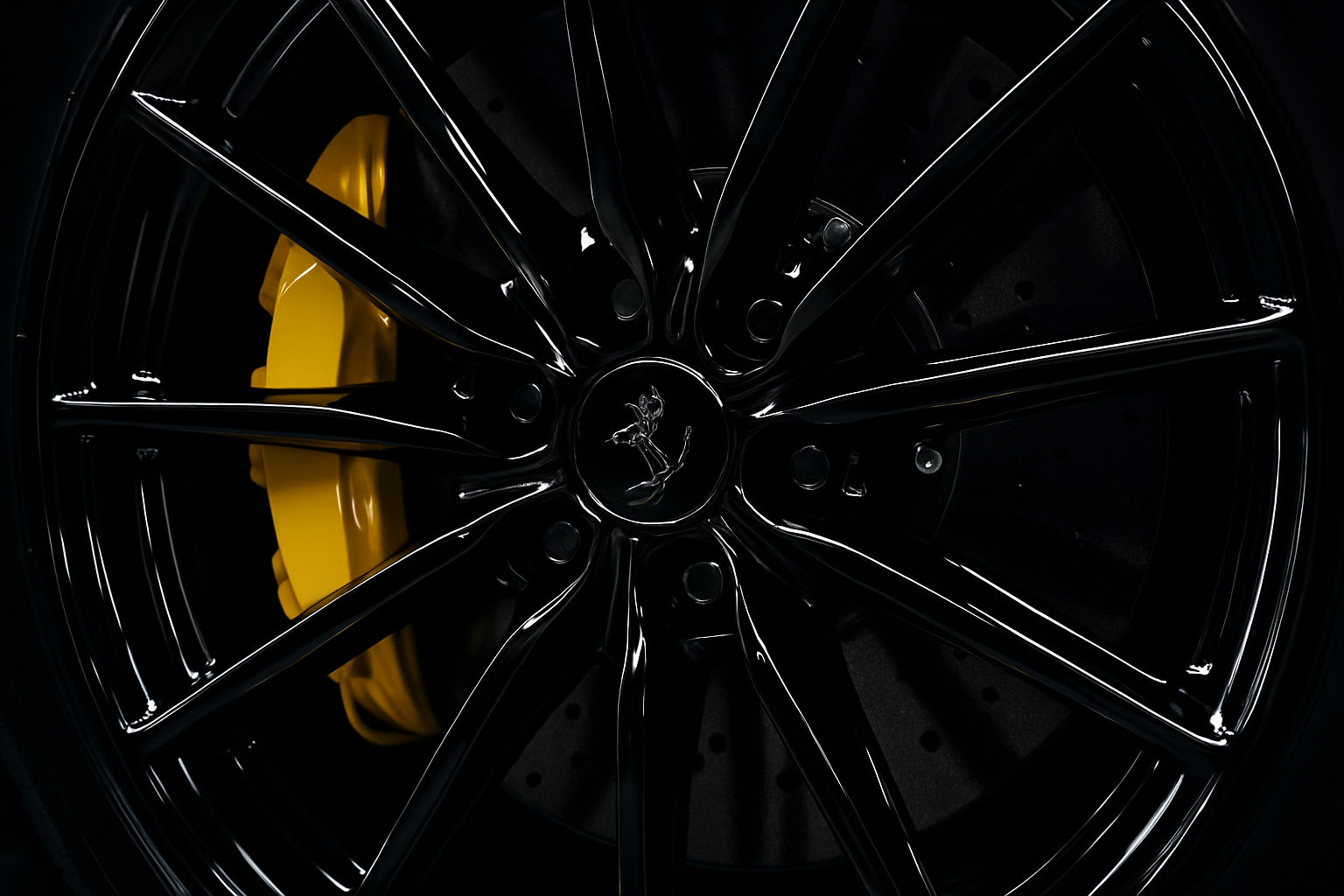 An ultra-realistic, dramatic close-up photograph of a stunning, complex, gloss black multi-spoke wheel on a luxury sports car. Behind the spokes, a vibrant yellow brake caliper is visible. Both the wheel and caliper are flawlessly clean and have a deep, glossy, ceramic-coated sheen. The lighting is high-contrast, studio-quality, emphasizing the sharp reflections and pristine condition.
